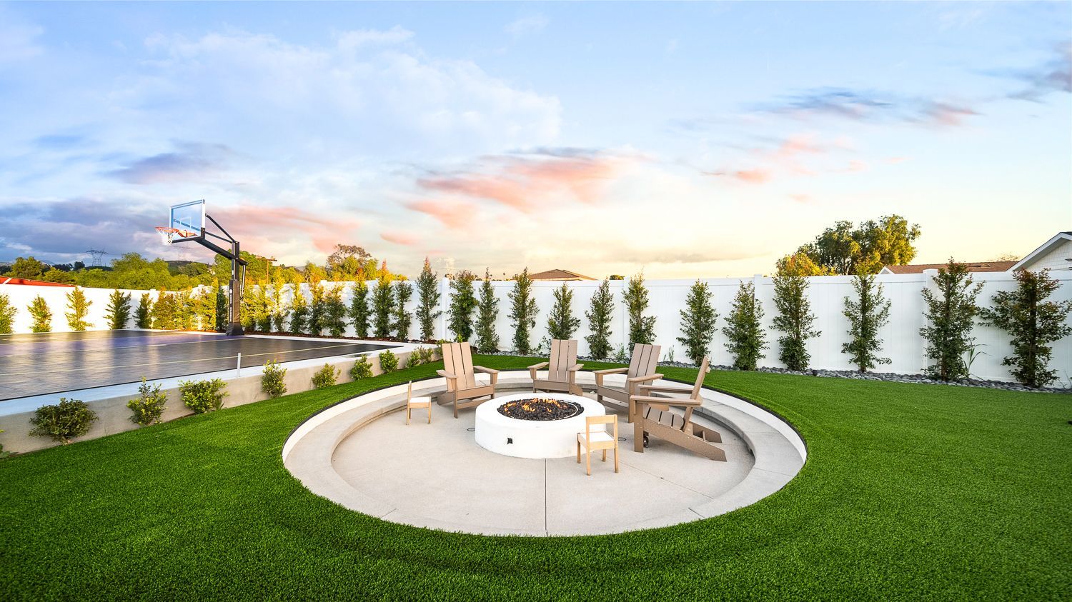 Custom pool and outdoor living project complete with a full court basketball court and outdoor kitchen. Project by Westmod. Location = Santa Clarita, CA.