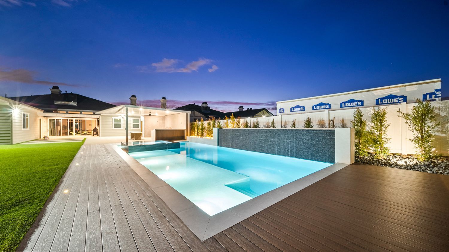 Custom pool and outdoor living project complete with a full court basketball court and outdoor kitchen. Project by Westmod. Location = Santa Clarita, CA.