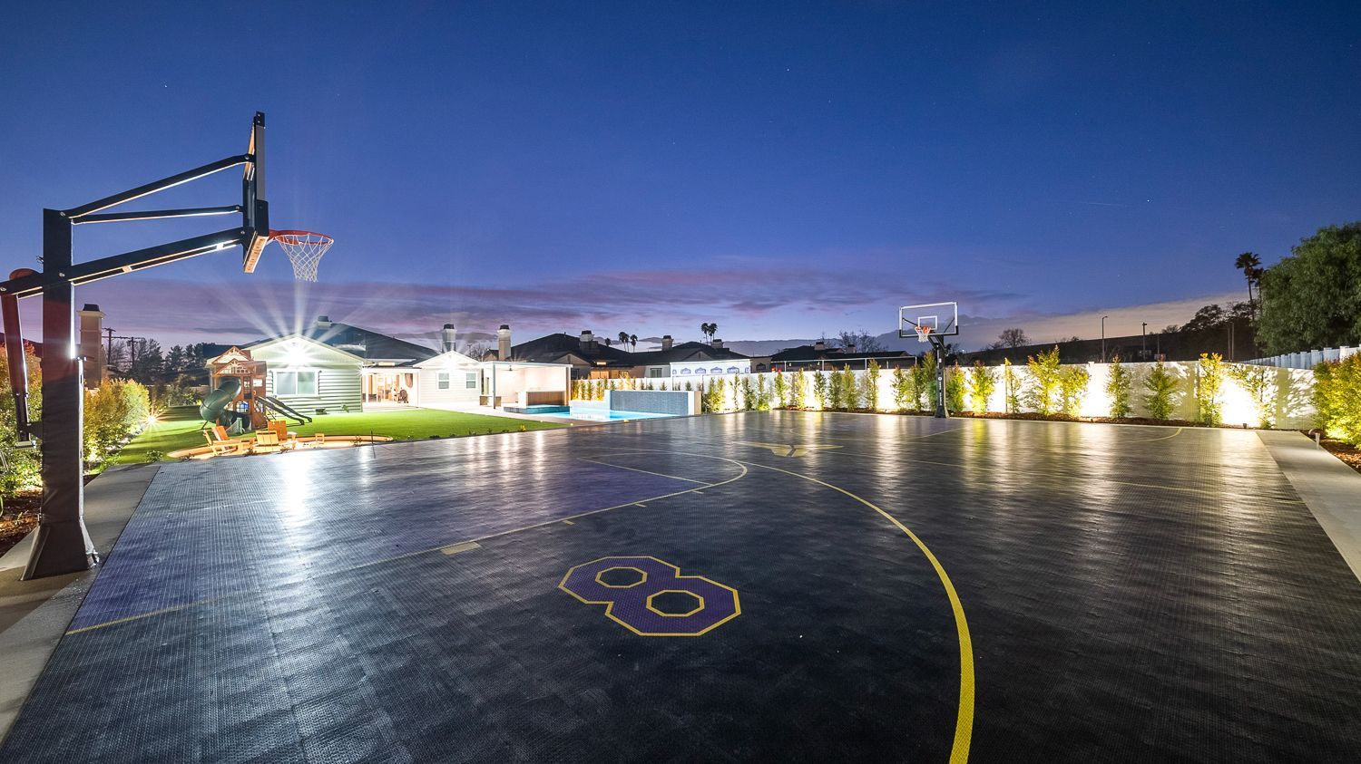 Custom pool and outdoor living project complete with a full court basketball court and outdoor kitchen. Project by Westmod. Location = Santa Clarita, CA.