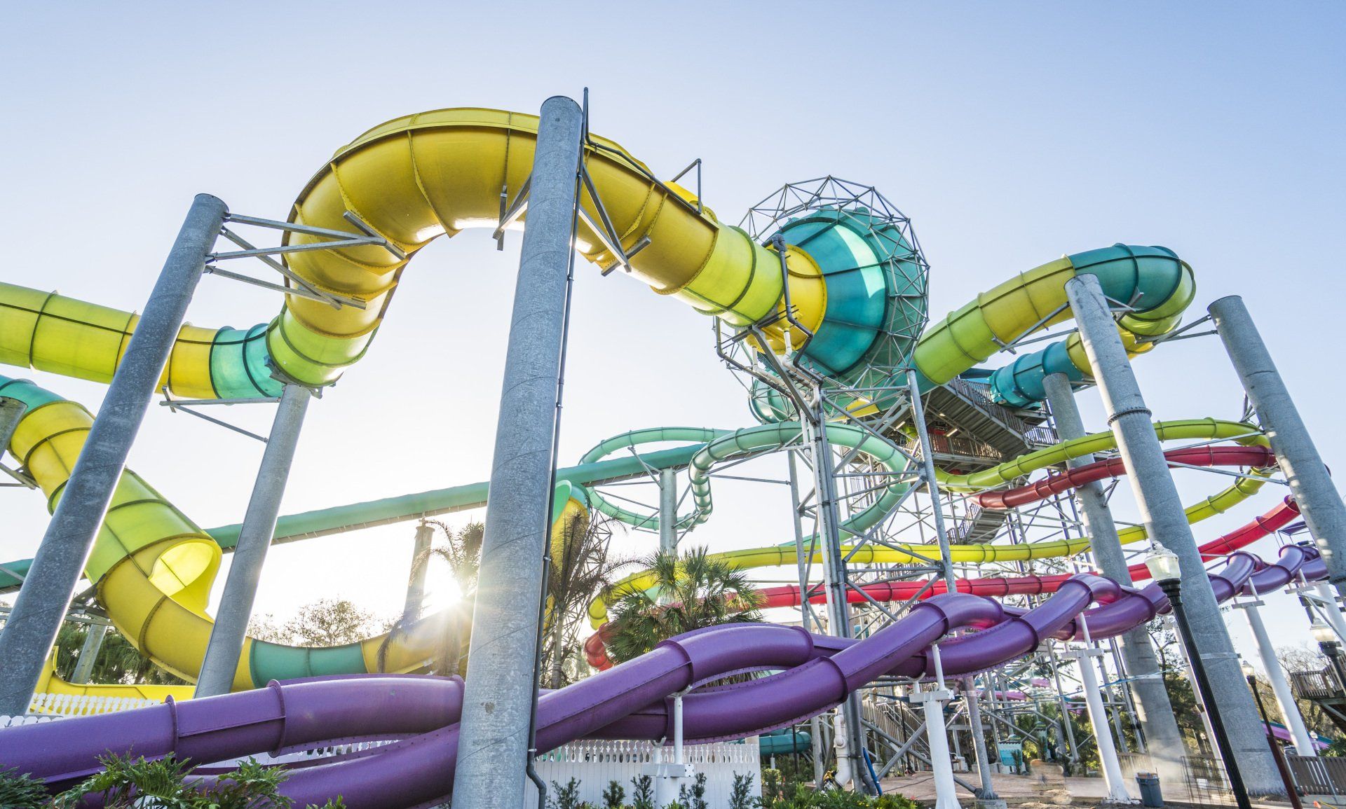 A water park with a lot of colorful water slides.