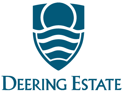 A blue and white logo for deering estate