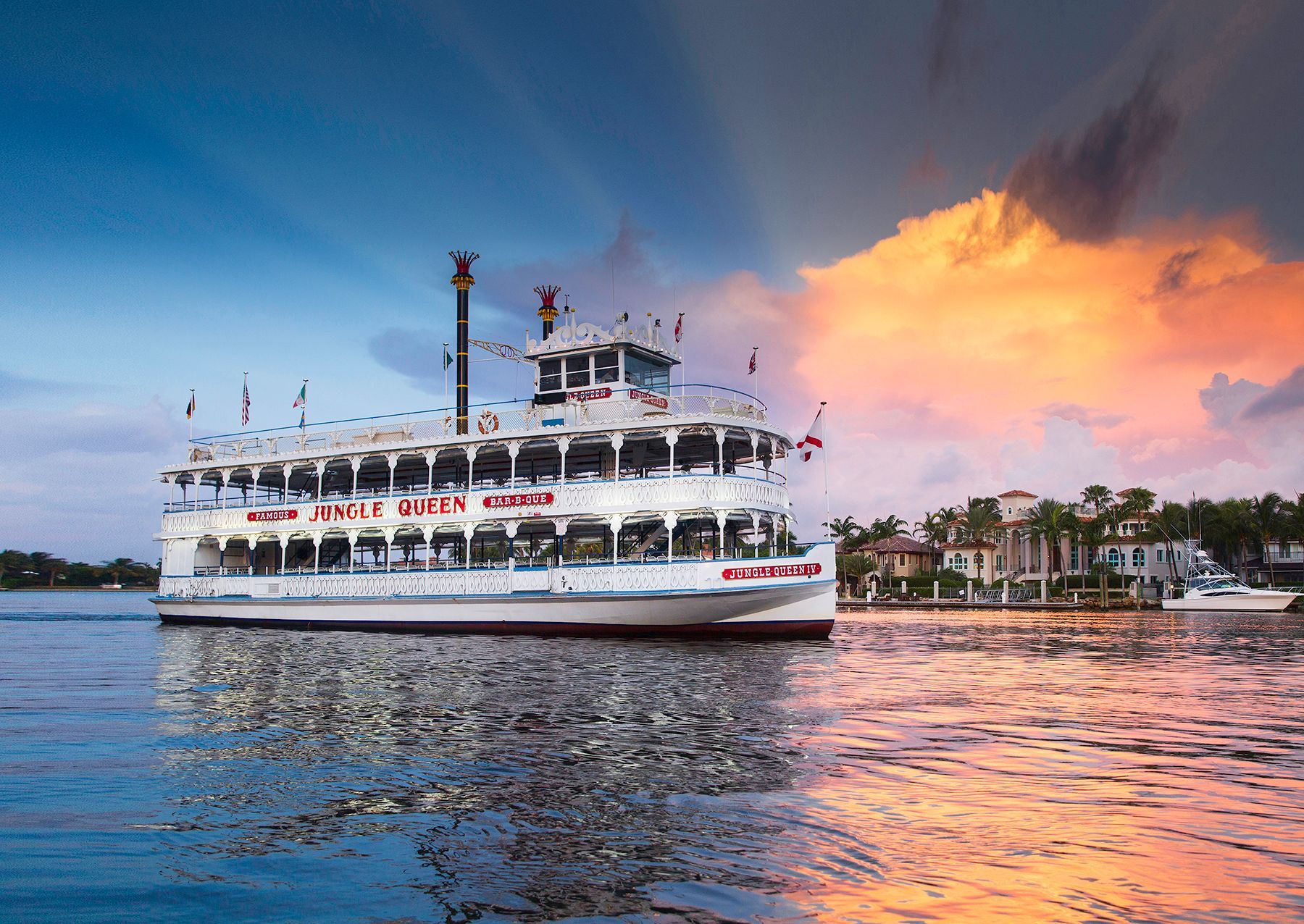 A large boat is floating on top of a body of water.