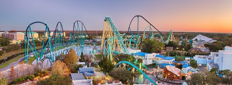 An aerial view of a roller coaster at an amusement park.
