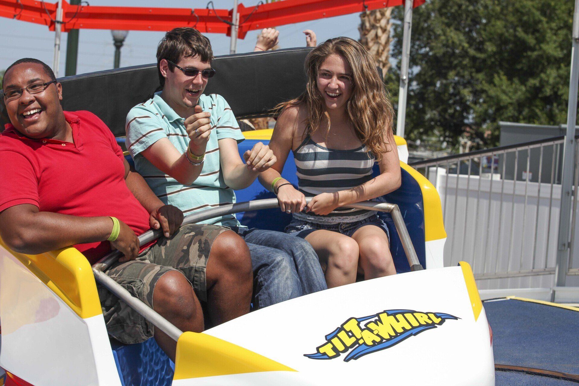 A group of people are riding a roller coaster that says citymarlin