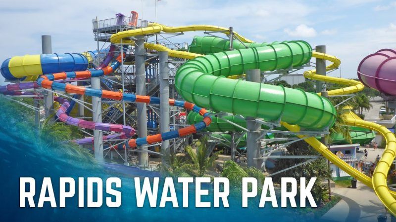 A water park with a lot of colorful water slides.