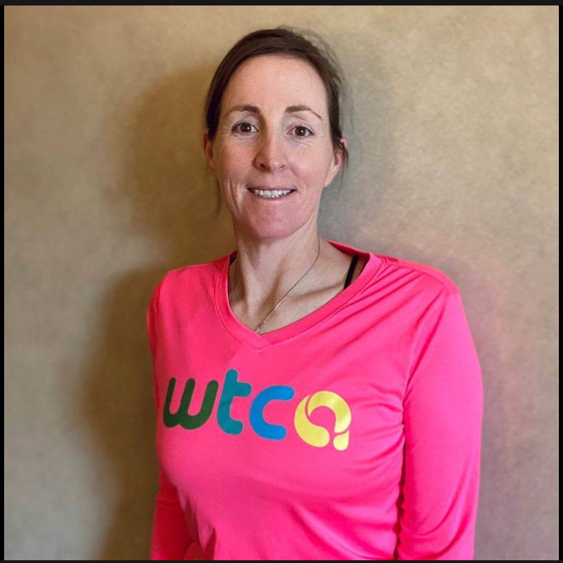 Woman in a pink shirt with 