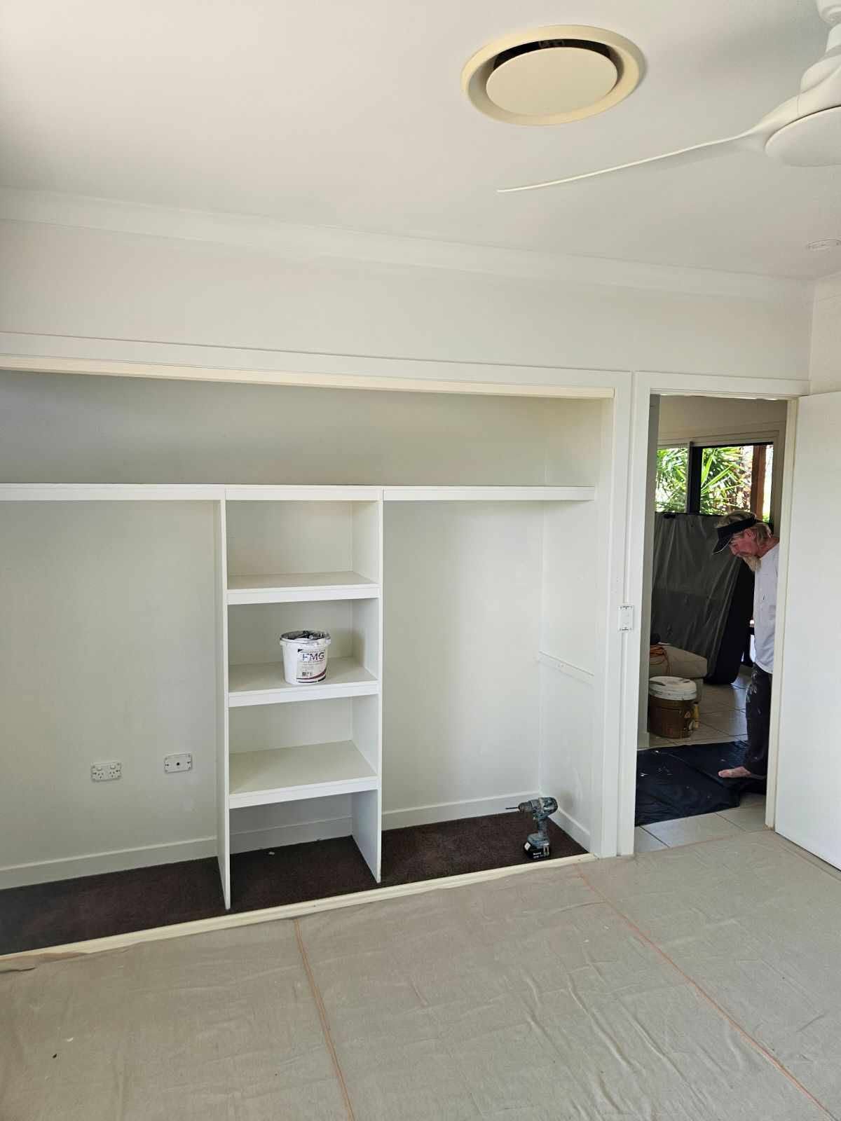Small White Bedroom with Built In Shelves — Chops Painting in Coral Cove, QLD