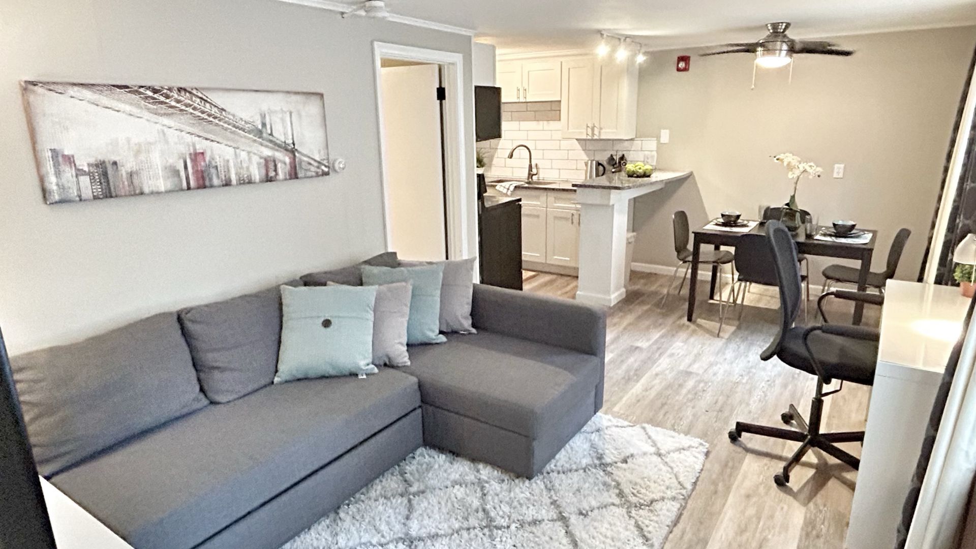 Furnished living area in a private one-bedroom apartment at Four Corners Apartments near UConn in Storrs, CT