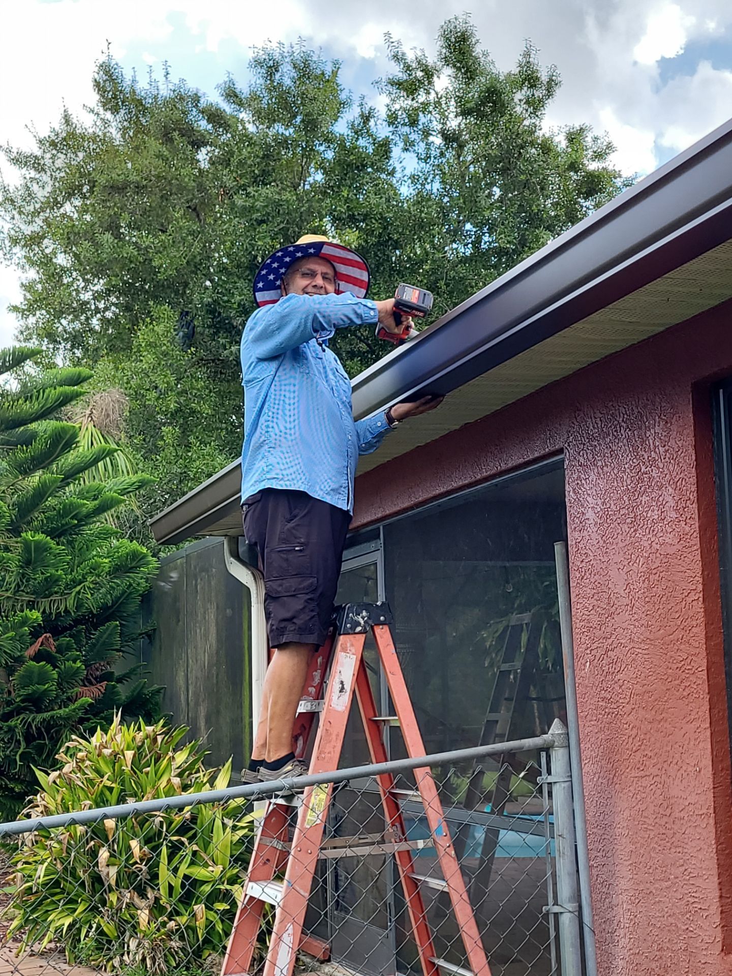 Heads Up Roofing founder installing 7inch K-Style Gutters in Florida. #1 Gutter Install