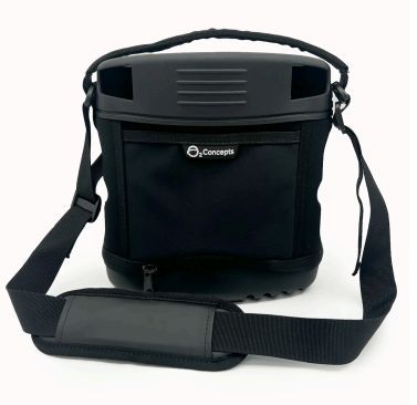 Purificador o humidificador de aire compacto blanco con ventilación lateral y botones de control en la parte superior.