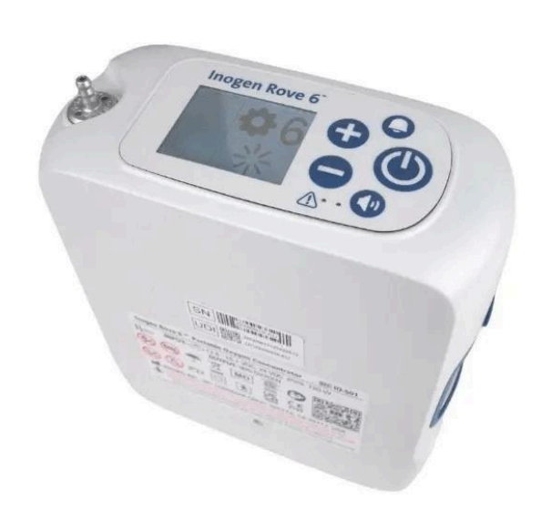 Concentrador de oxígeno portátil blanco con pantalla digital y botones de control.