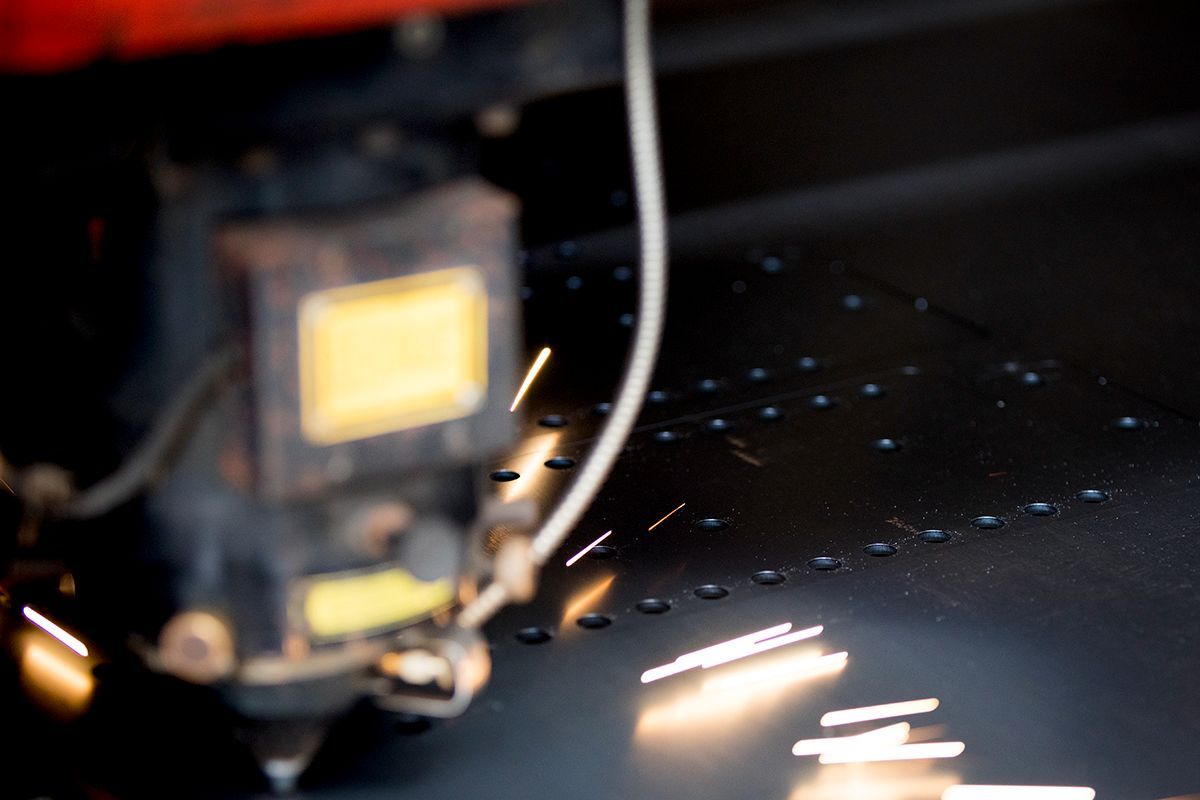 Close-Up Laser Cutting Metal Sheet — Sheet Metal Fabrication In Caloundra, Qld