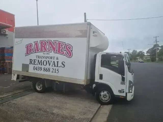 White Barnes Transport & Removals Truck Parked on A Curb Beside a Road — Barnes Transport and Removals in Wardell, NSW