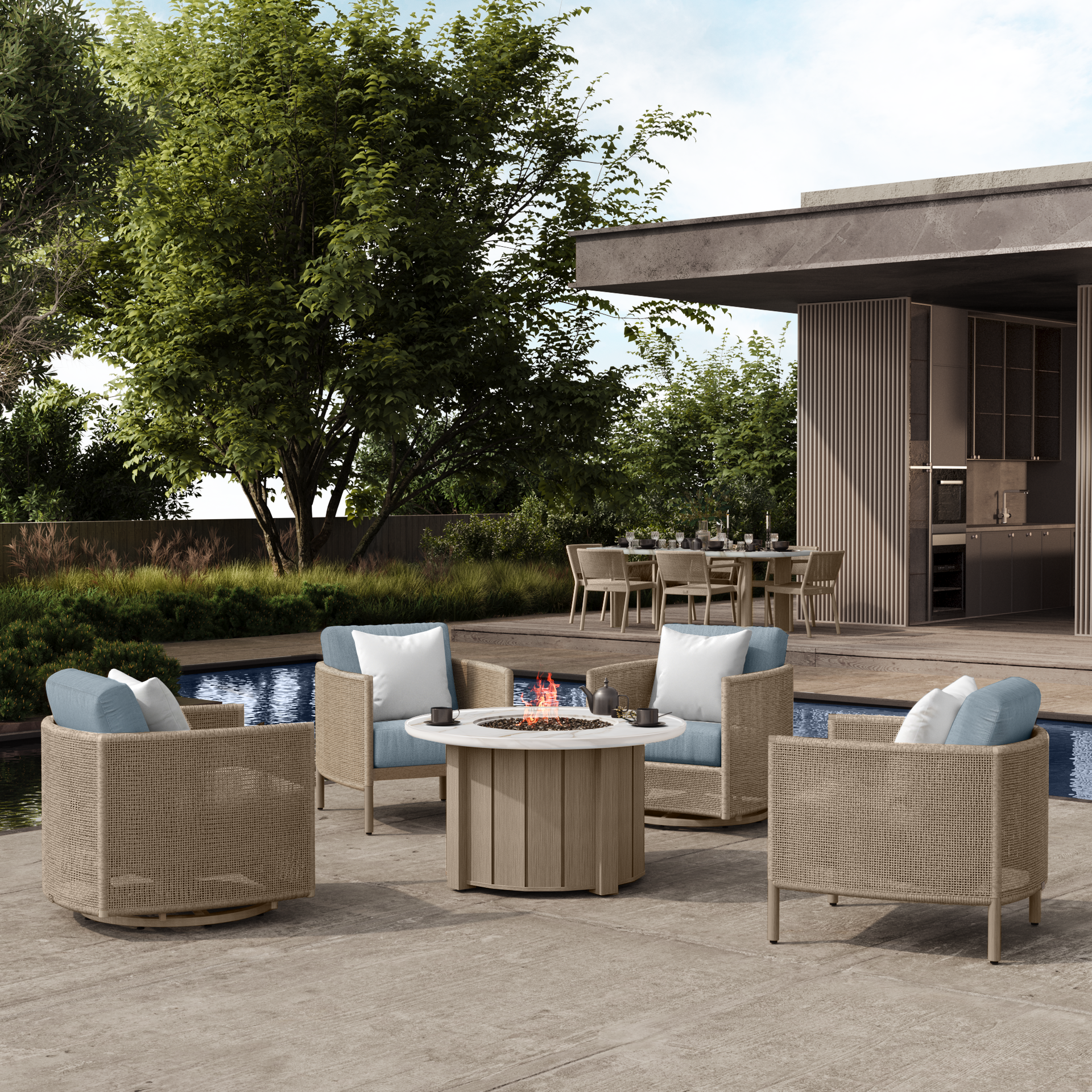 Outdoor seating arrangement with fire pit, pool, and dining area.