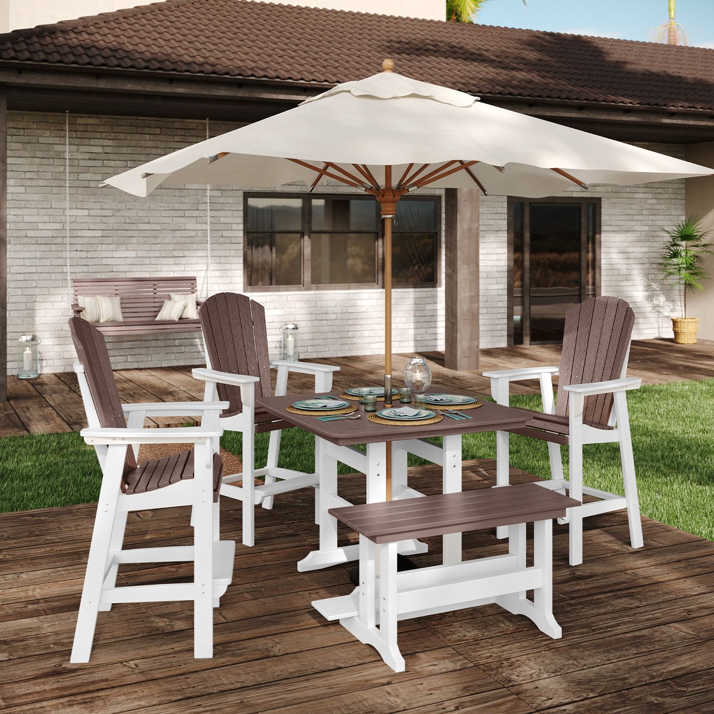 Outdoor dining set: white and brown chairs, a table, bench, and umbrella on a deck.