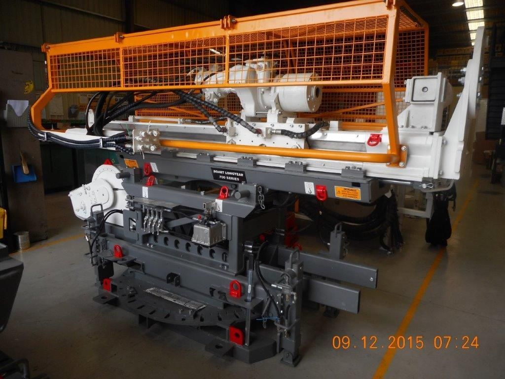 A machine is sitting in a warehouse with a photo taken on 03 12 2015 07:24