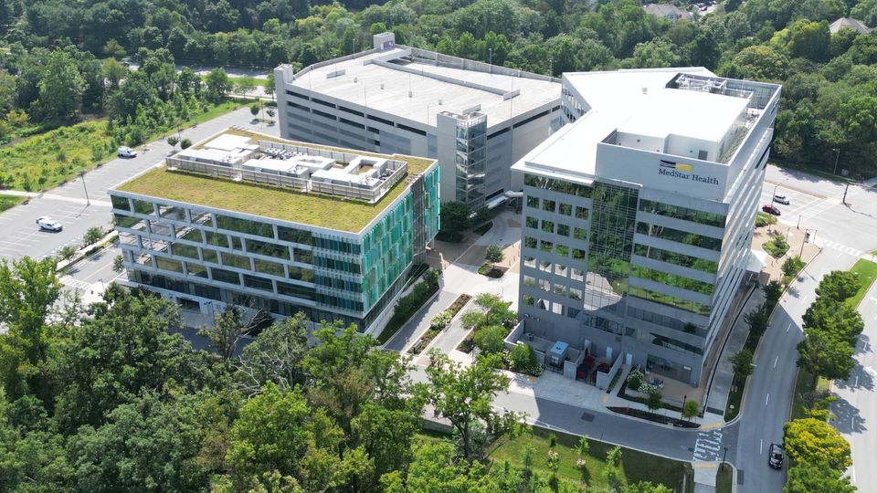 An aerial close-up of the building's front facade from above