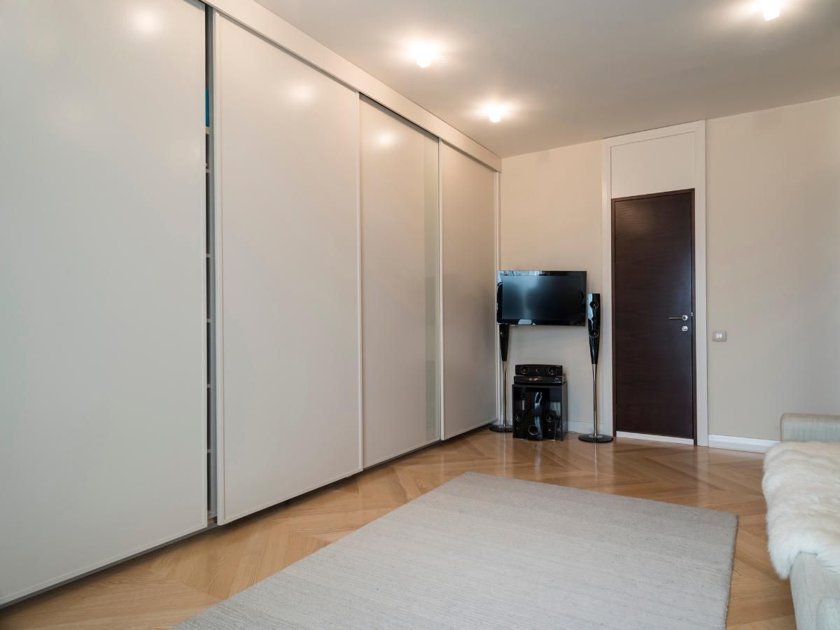 Spray Maestro after spray painting fitted wardrobes to light cobblestone
