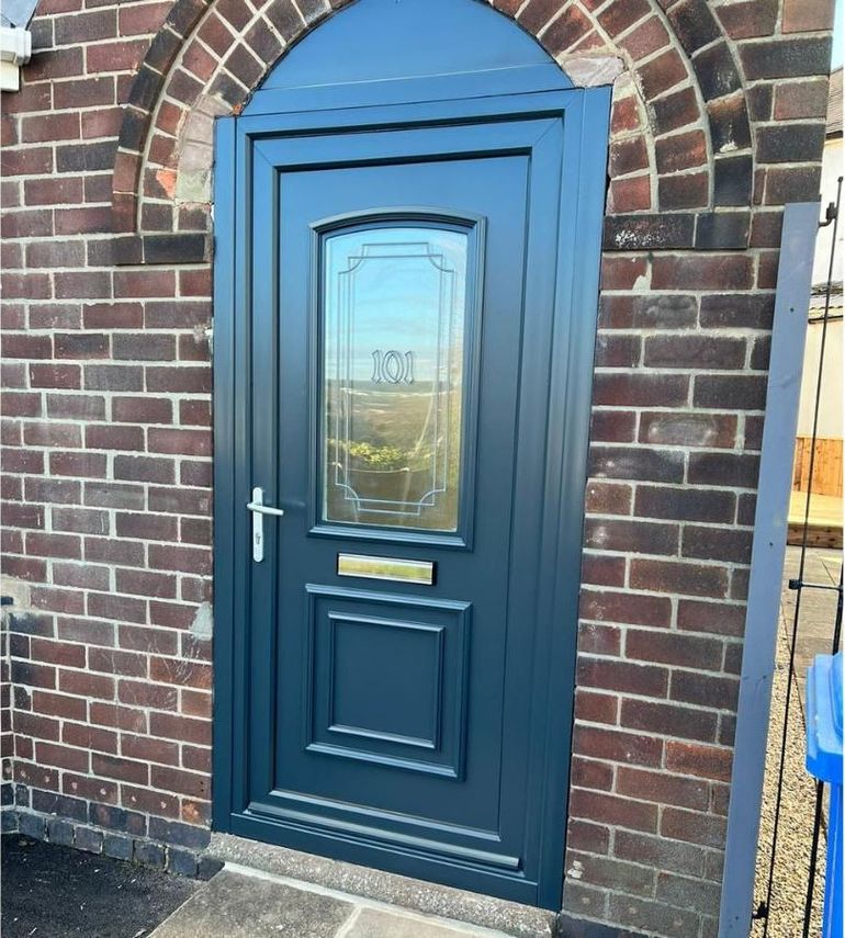 The same Bakersfield door after spraying a deep blue