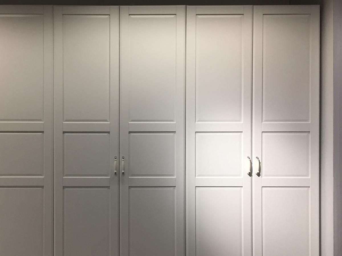 Spray Maestro after finishing a fitted wardrobe paint spraying project from wood to grey