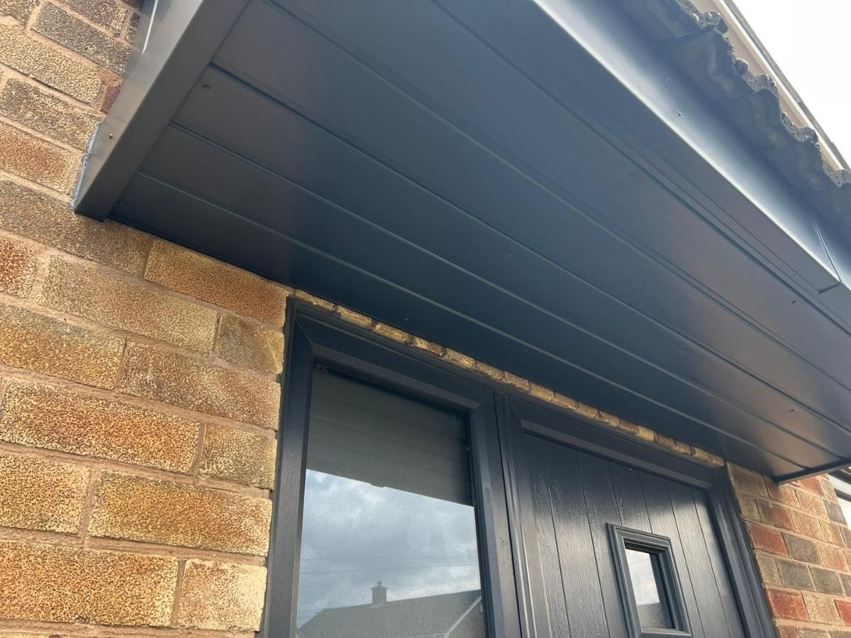 Spray Maestro porch after soffit paint spraying grey