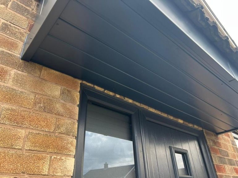 The Carlton soffit boards after spraying anthracite grey