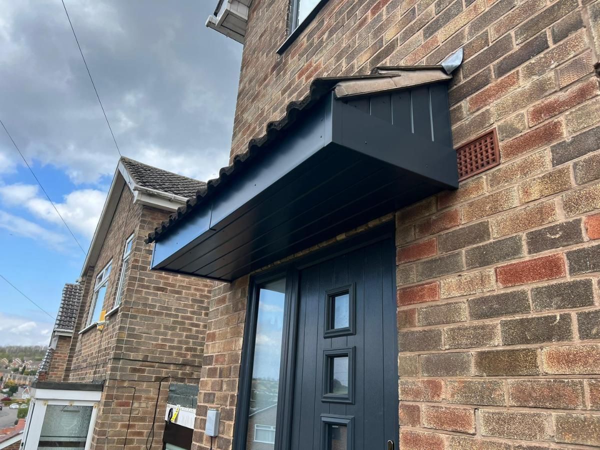Spray Maestro anthracite porch soffit and facia boards after respraying