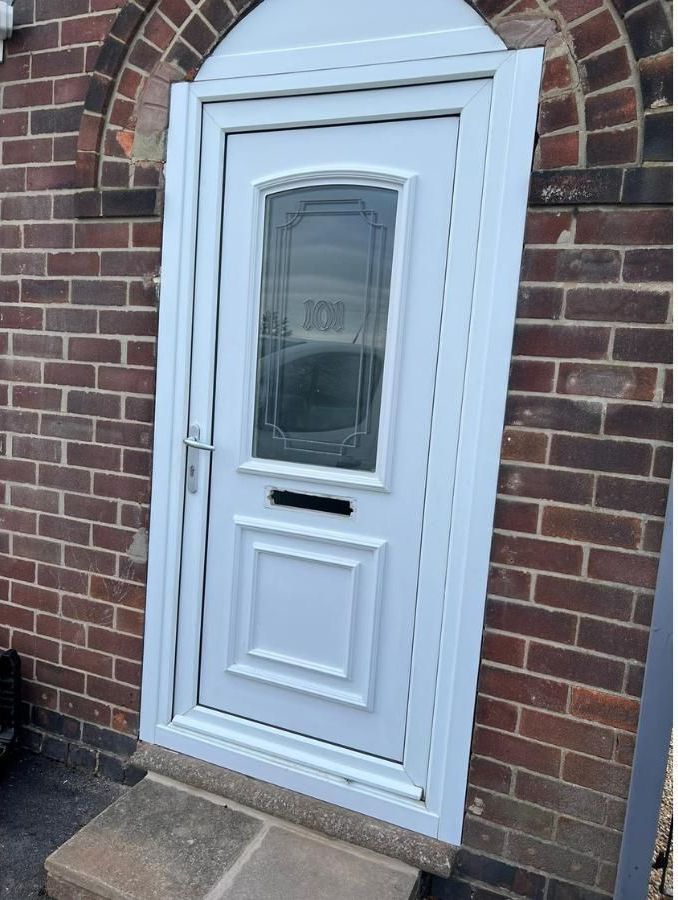 Spray Maestro white upvc front door before door spraying service