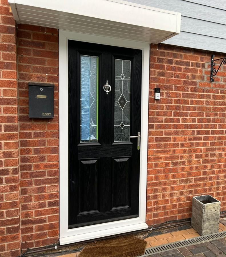 Spray Maestro before front door spraying with door and frame being different colours