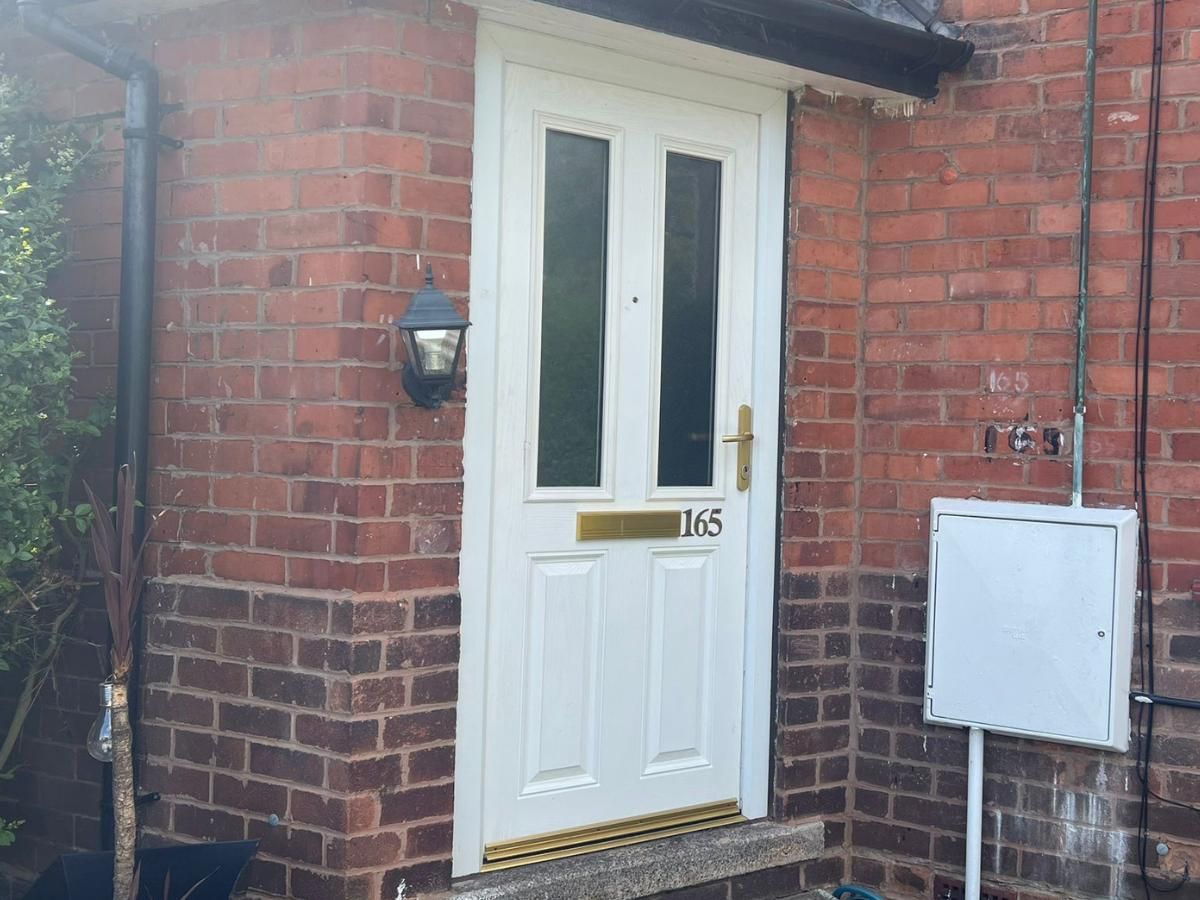 Spray Maestro before UPVC door spraying the original white door
