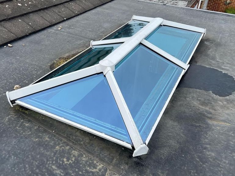 White uPVC roof lantern on a flat roof in Lambley before spraying