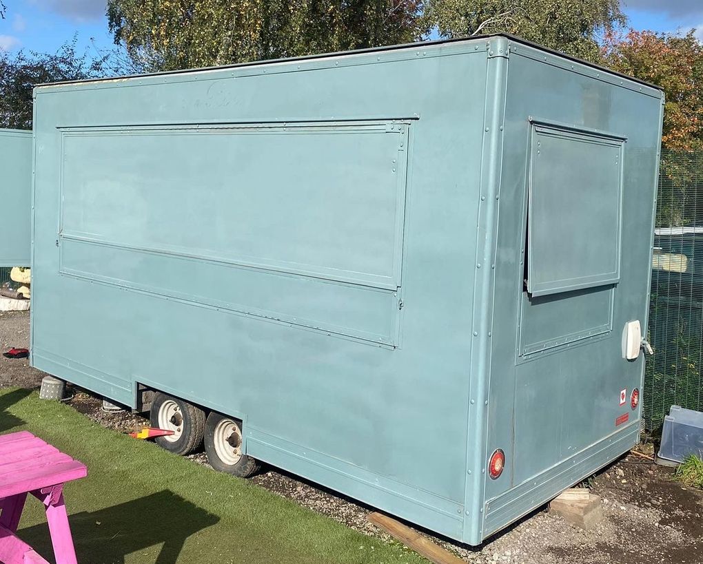 Teal catering trailer before respraying