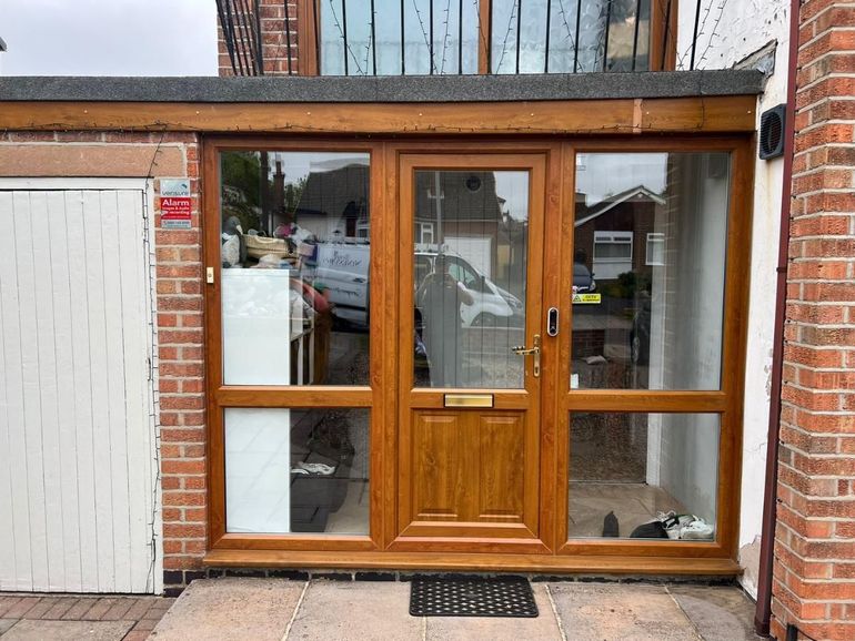 Woodgrain uPVC front door and glazed porch panels in West Bridgford before spraying