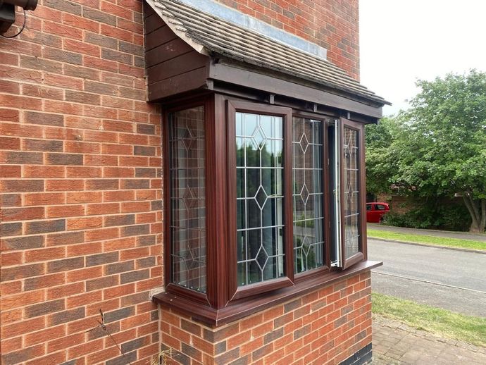 Original brown UPVC windows, Arnold, Nottingham