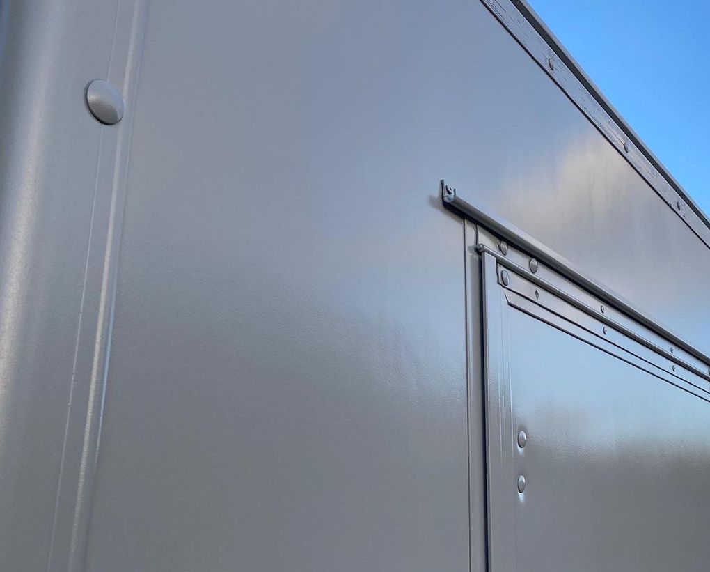 Close-up of the smooth sprayed finish on the Agate Grey catering trailer