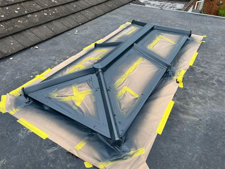 The Lambley roof lantern with its glass masked during spraying