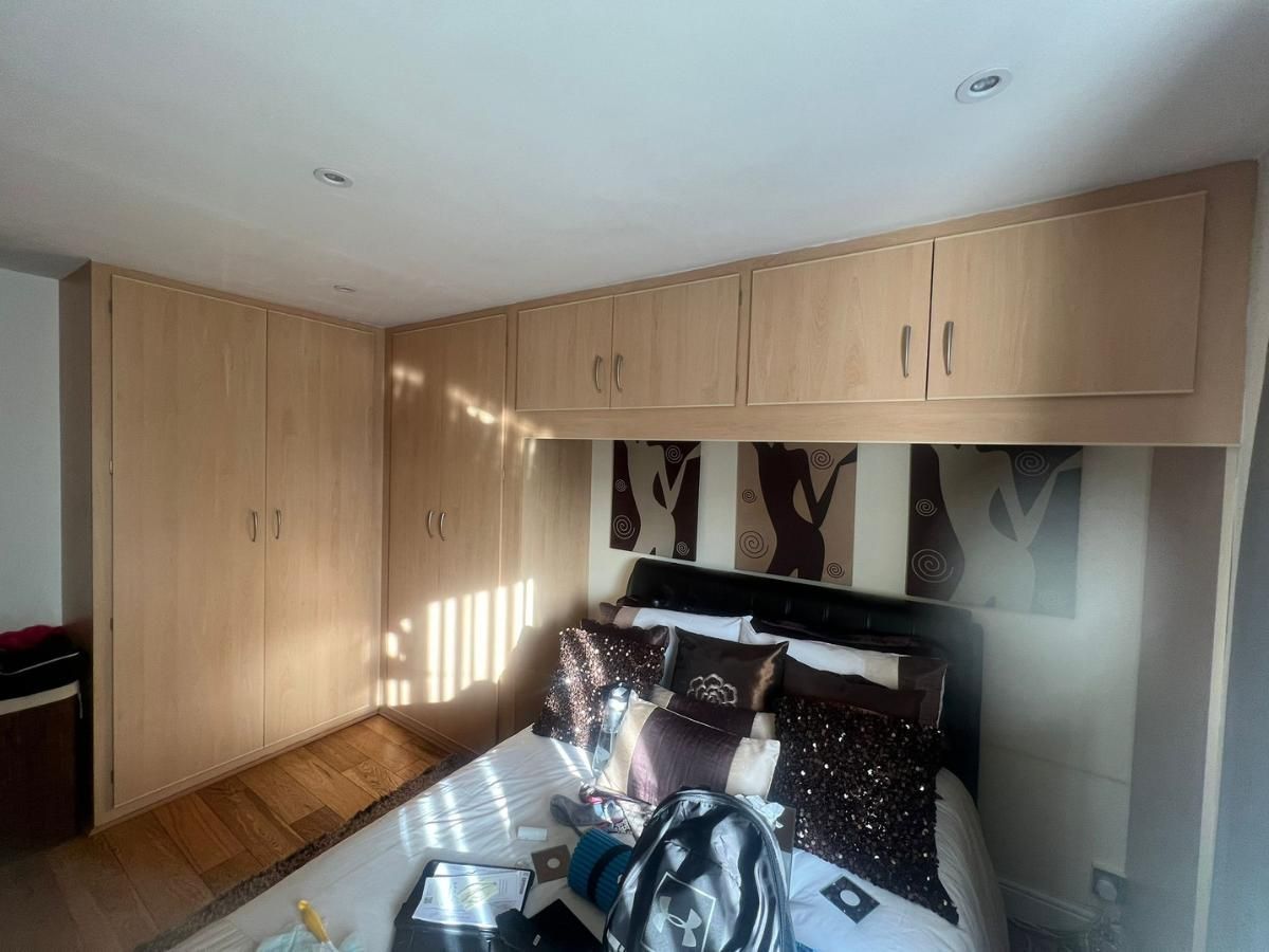 Spray Maestro before spray painting fitted wardrobes and overhead cupboards in a bedroom