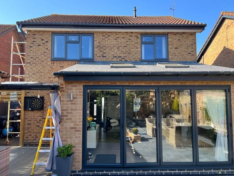 Rear extension with uPVC windows and bifold doors sprayed charcoal grey