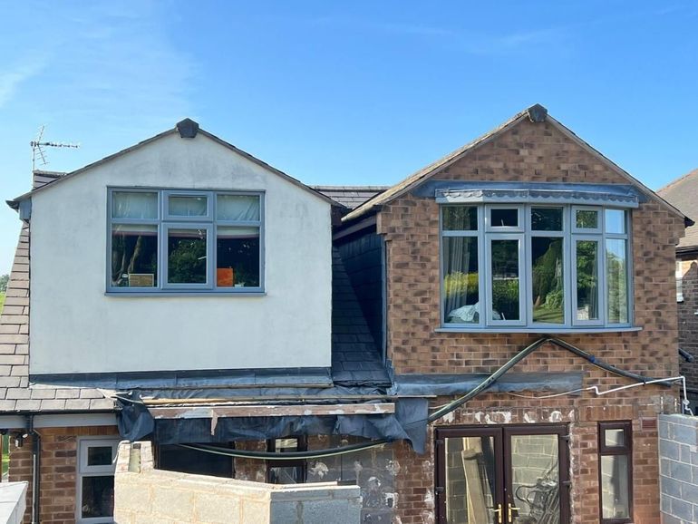 The same house after its uPVC windows were sprayed Manor House Grey