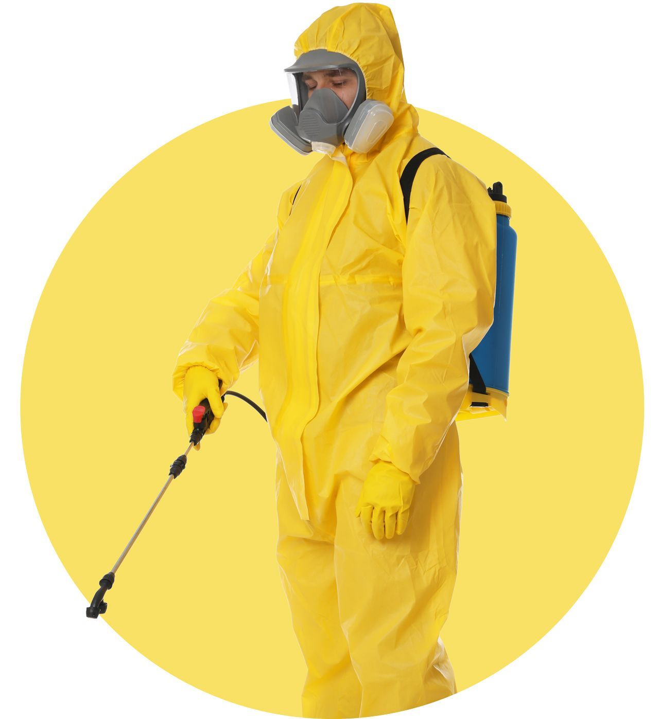 A man in a yellow protective suit is spraying something with a sprayer. A man in a yellow protective suit is spraying something with a sprayer.