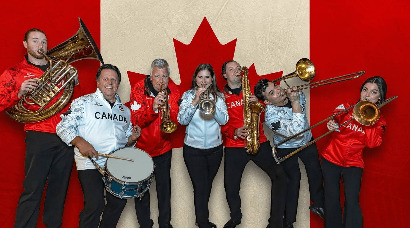 Group of six musicians posing with brass instruments in front of a red Canadian flag backdrop