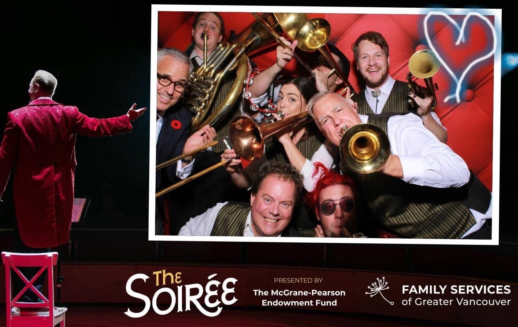 Promotional poster for The Soirée showing a lively brass band performing on stage with red lighting.