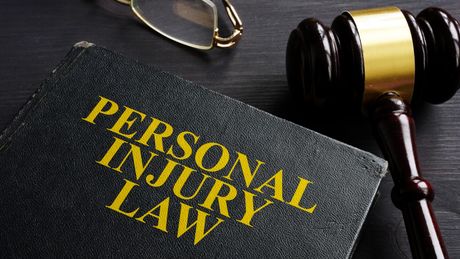 Personal Injury Law Book And Gavel — Goshen, NY — Owen Law Firm PLLC Personal Injury Law Book And Gavel — Goshen, NY — Owen Law Firm PLLC
