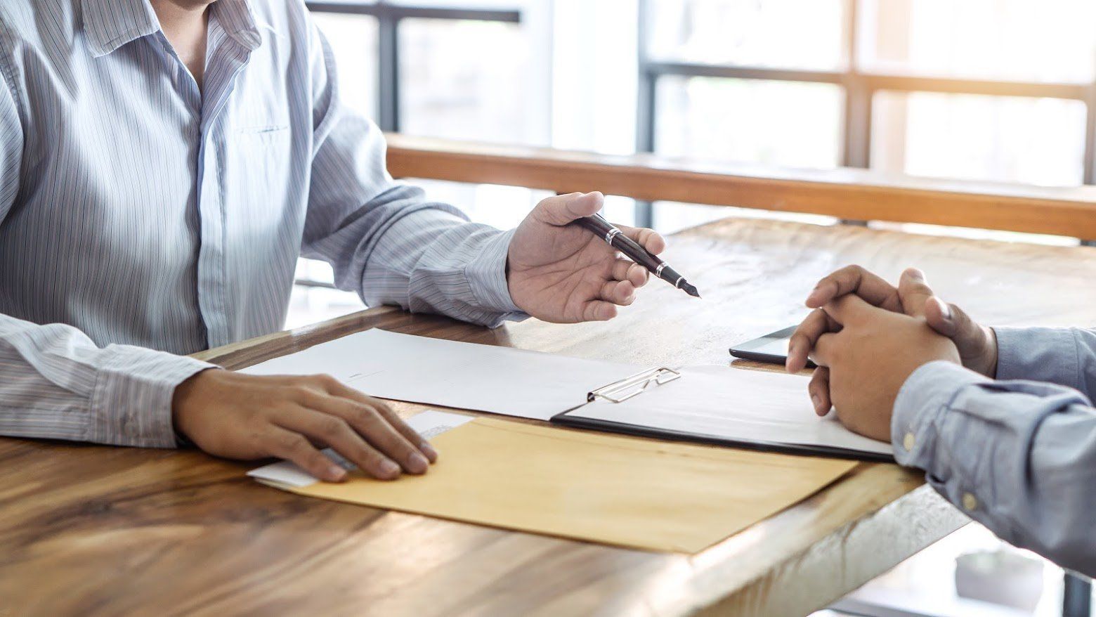 Lawyer Discussing With Client — Goshen, NY — Owen Law Firm PLLC