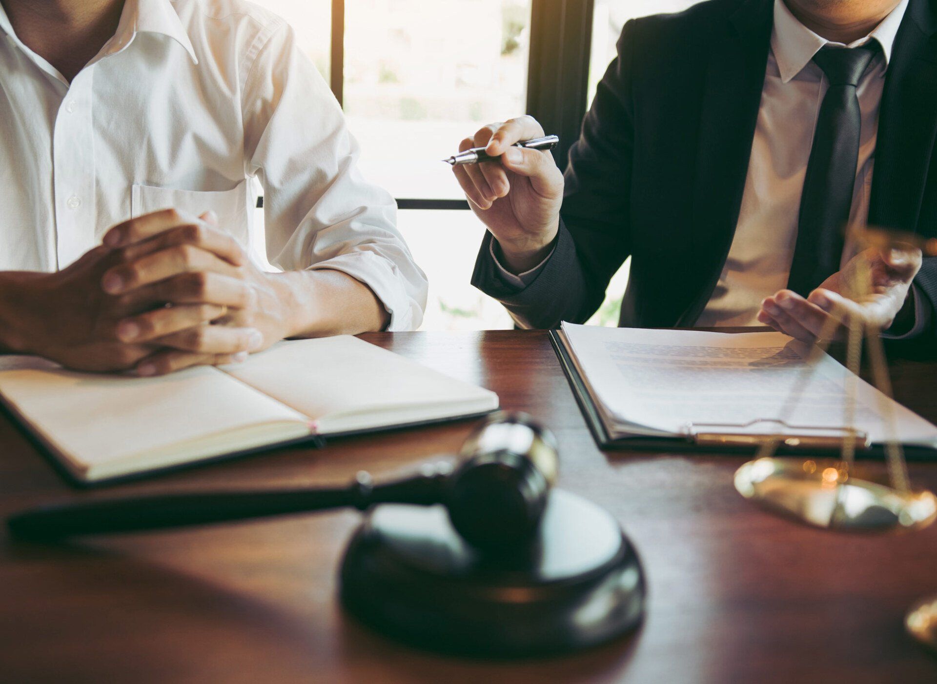 Lawyer And Man Handshaking — Goshen, NY — Owen Law Firm PLLC