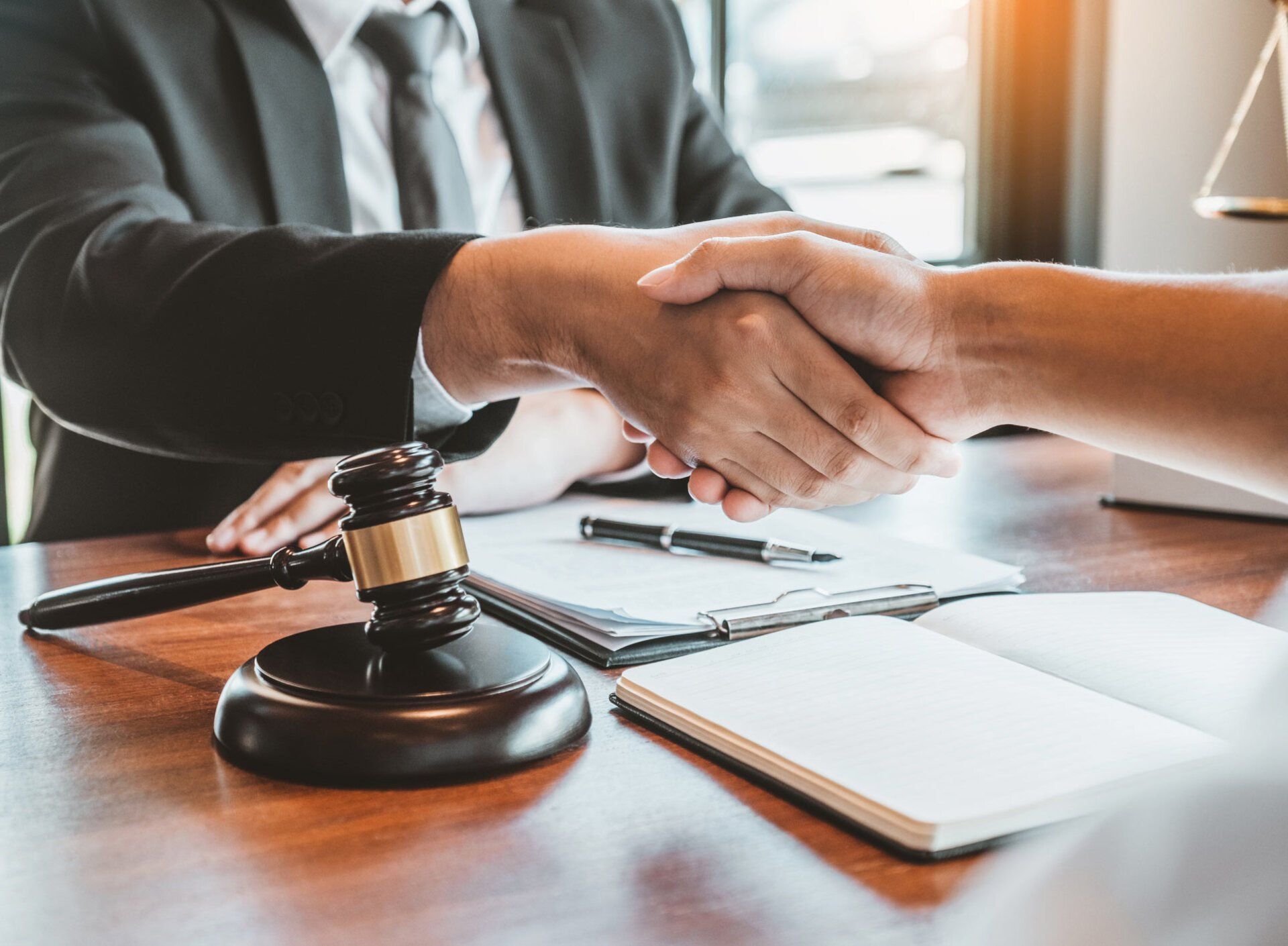Lawyer And Client Hand Shaking — Goshen, NY — Owen Law Firm PLLC Lawyer And Client Hand Shaking — Goshen, NY — Owen Law Firm PLLC
