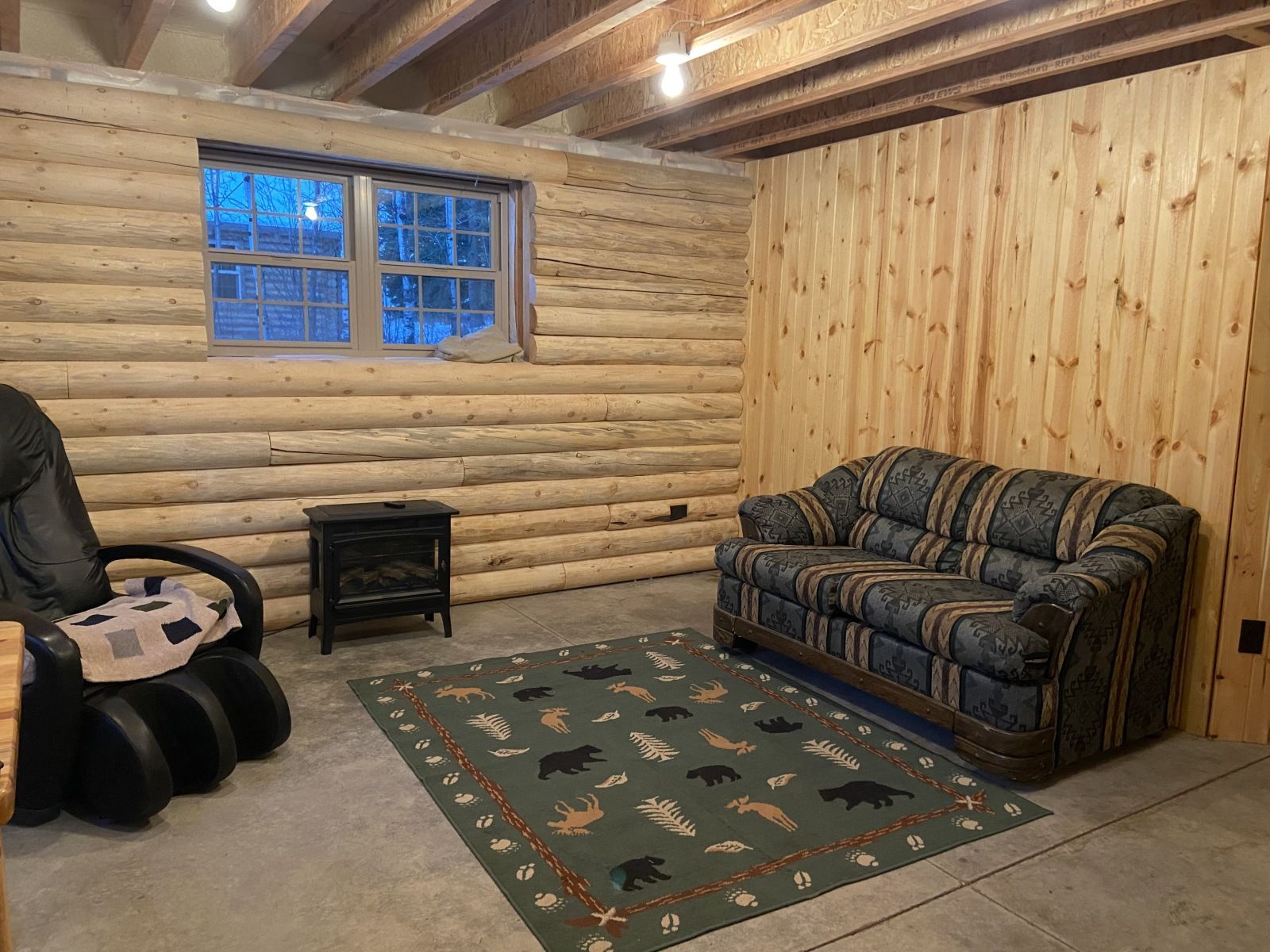 Basement Family Room with massage chair...still under construction