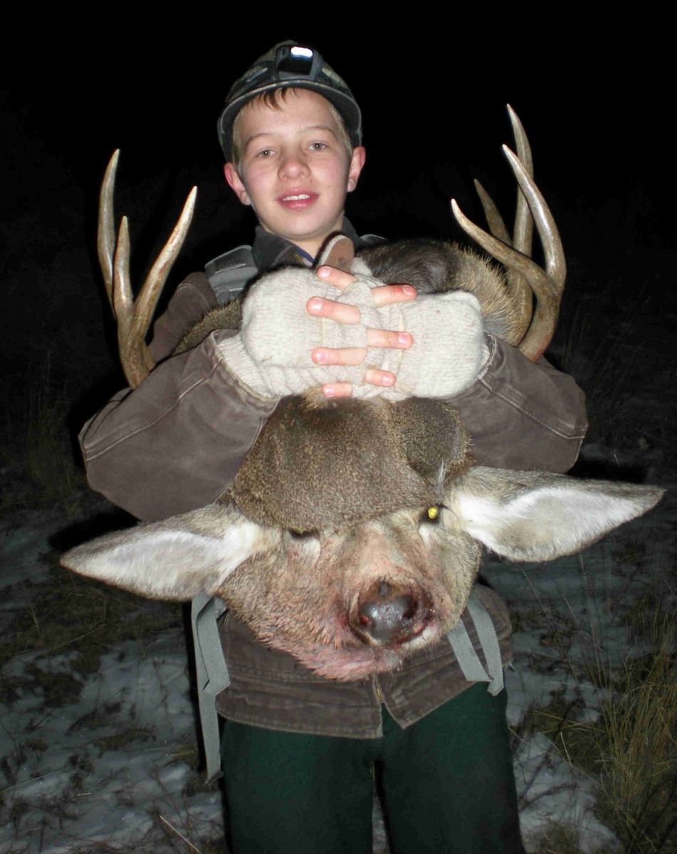 He's a Keeper!(the kid and the buck!)