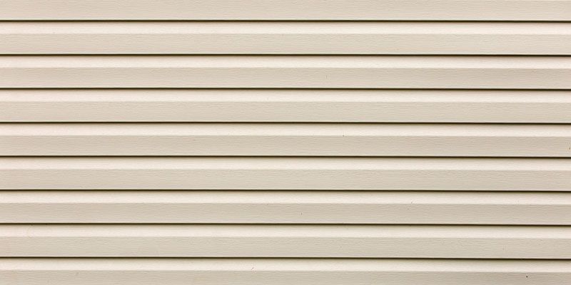 Beige horizontal siding.