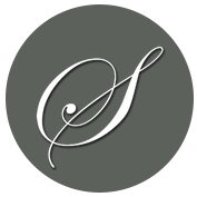 The letter s is in a circle on a gray background.